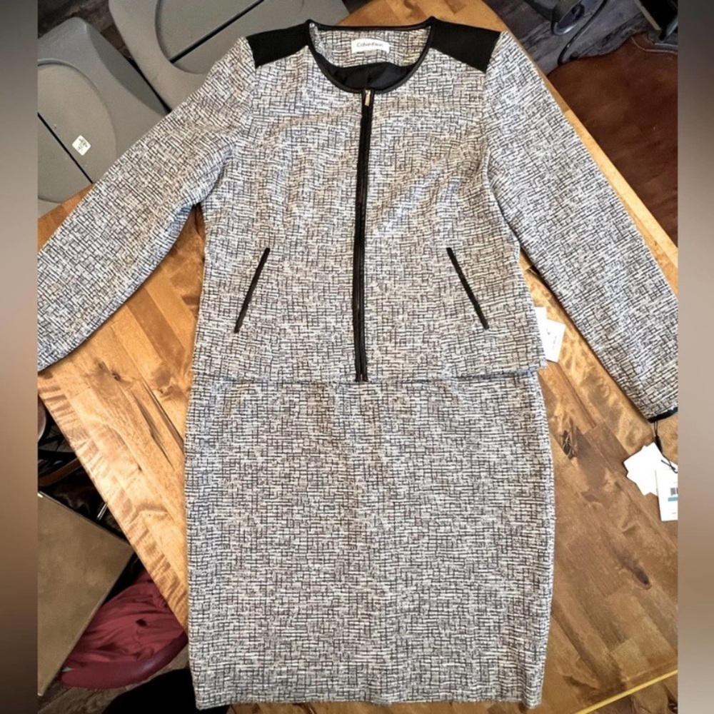 Brand new with tags, Calvin Klein, Women's Suit with Faux Leather Trim. Size 16.